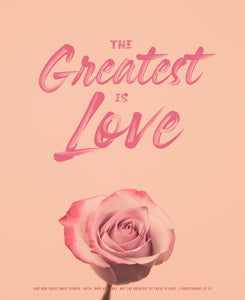 "The Greatest is Love" in pink in handwritten script. "And now these three remain: faith, hope and love. But the greatest of these is love." 1 Corinthians 13:13. Background is light pink with a single flower at the bottom.