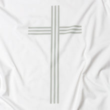 Load image into Gallery viewer, Close up of simple, elegant and linear Christian cross in gray on white t shirt