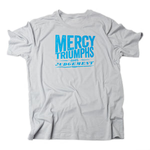 James 2:13, Mercy triumphs over judgement, printed in blue on back of gray t shirt.