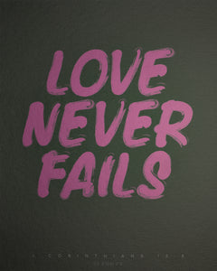 "LOVE NEVER FAILS" in bright purple hand written font on dark background.
