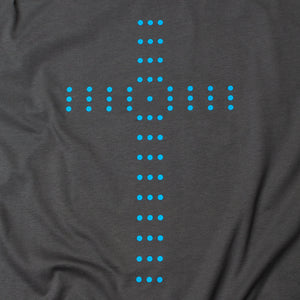 Close up of Charcoal t shirt with light blue cross made of circles