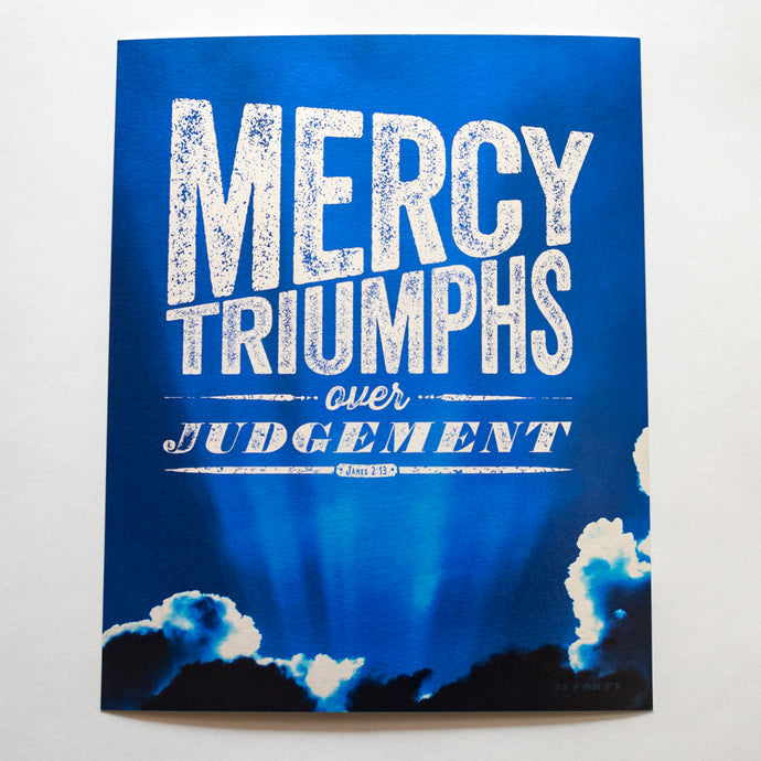 Mercy triumphs over judgement, James 2:13, with dramatic blue sky on metallic fine art paper